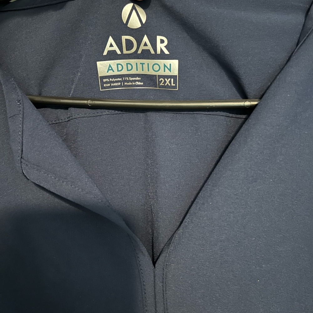 TWO sets of ADAR scrubs.